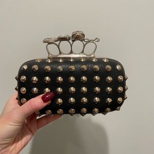 Black studded finger ring clutch